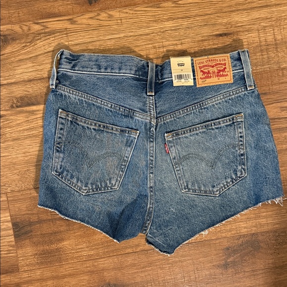 Levi's Women's Distressed Blue Jean Shorts - Picture 6 of 7